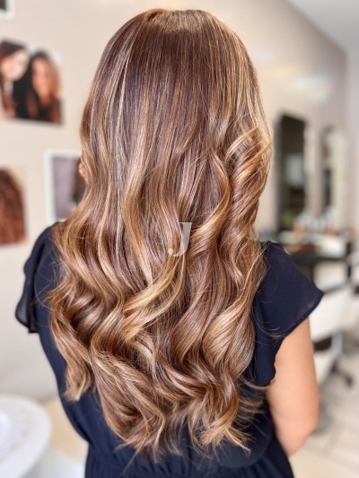 Foto di donna con capelli lunghi ramato chiaro