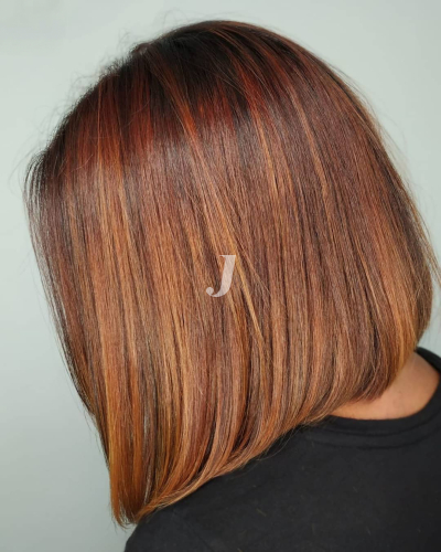 Foto di donna con capelli medi ramato medio